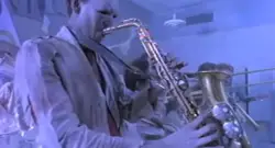 A zombie rocks out in the music video for "Be Chrool To Your Scuel."